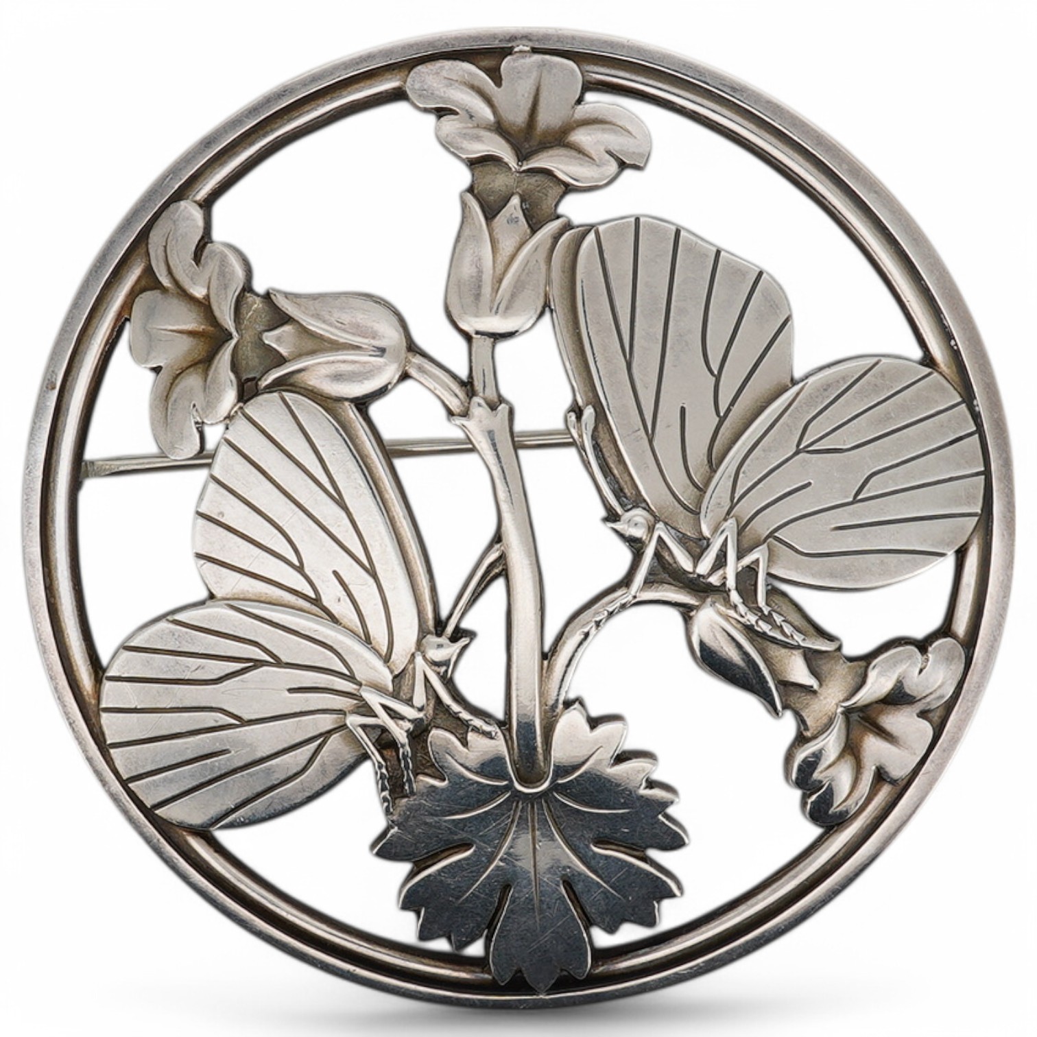 A Georg Jensen sterling moth and leaf circular brooch, design no. 283, 55mm, with Georg Jensen box. Condition - fair to good